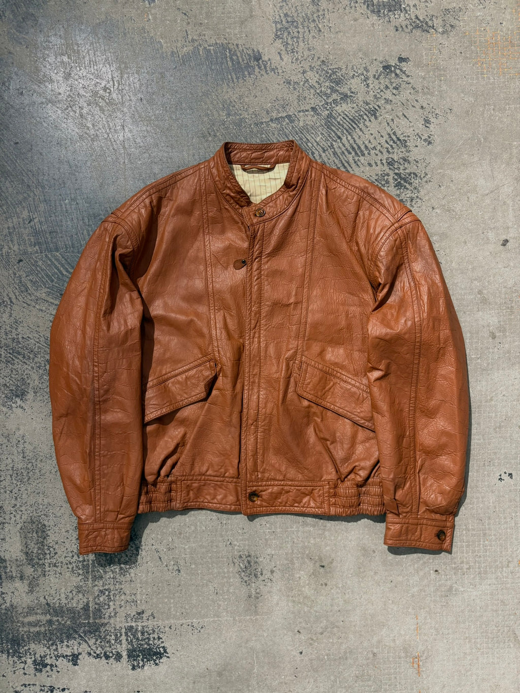 Giacca bomber pelle martellata tabacco L