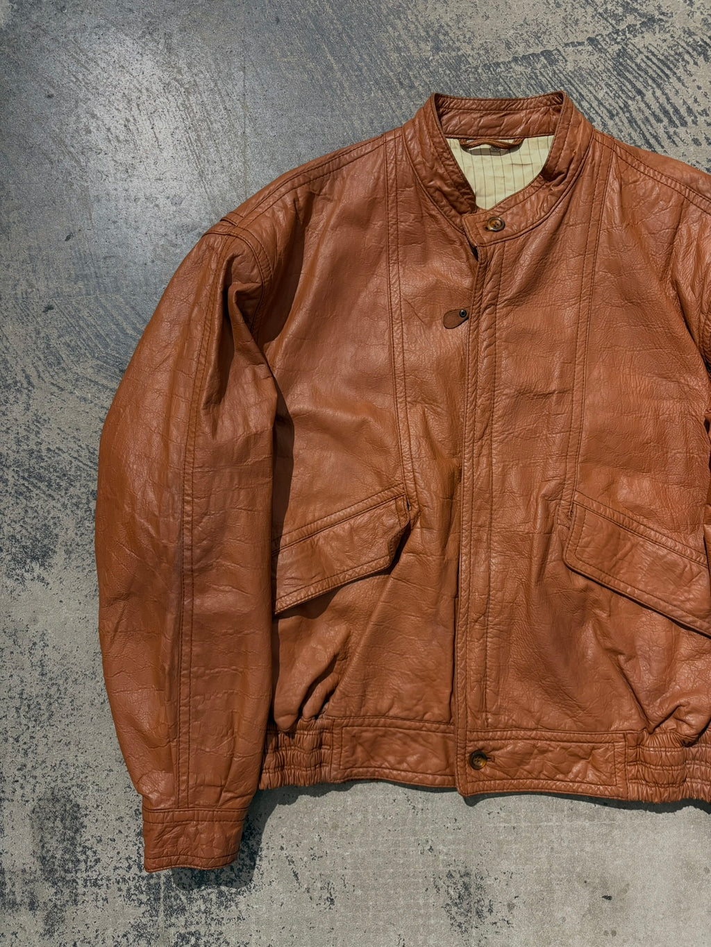 Giacca bomber pelle martellata tabacco L