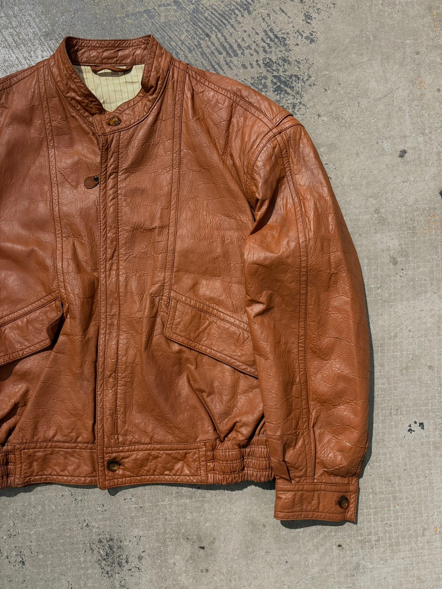 Giacca bomber pelle martellata tabacco L