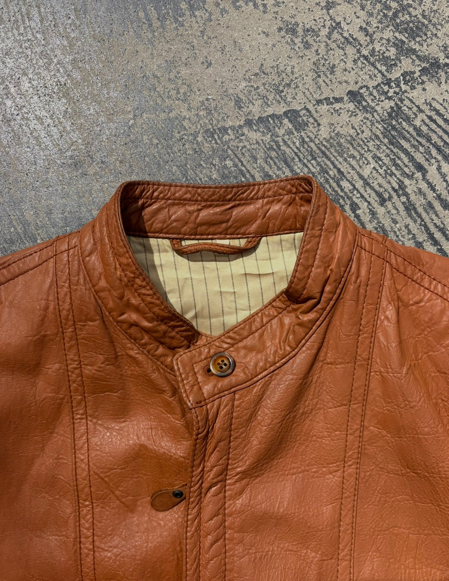 Giacca bomber pelle martellata tabacco L