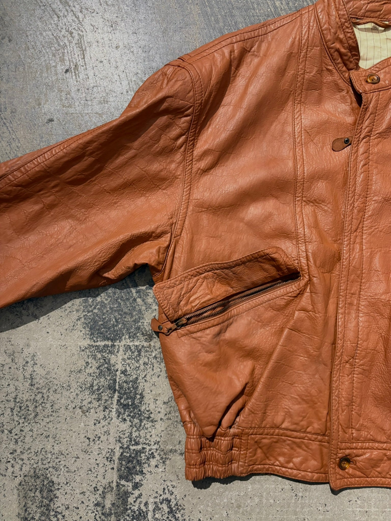 Giacca bomber pelle martellata tabacco L