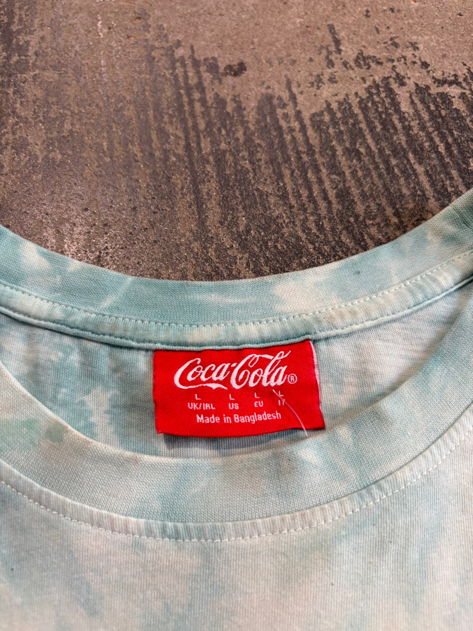 T-Shirt ufficiale Coca-Cola Tie-Dye "Have a Coke and a Smile" azzurro/bianco L